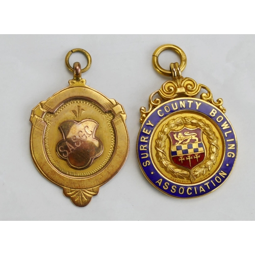 266 - A 9ct Gold and Enamel Surrey County Bowling Fob and one other 9ct gold fob, 16.74g