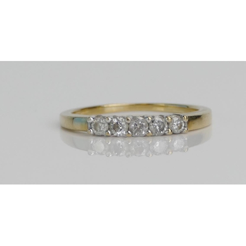 29 - A 9ct Gold and Diamond Five Stone Ring, c. 2.4mm brilliant round cuts, size K.75, hallmarked, 1.78g