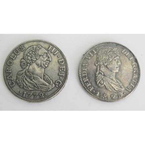 307 - A reproduction Ferdinand VII 8 Reales coin, and a Charles III 8 reales coin.