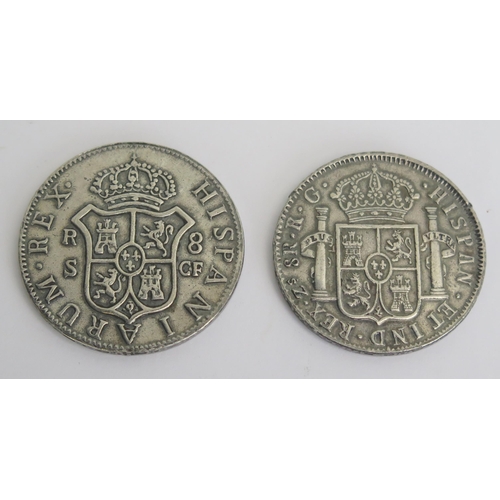 307 - A reproduction Ferdinand VII 8 Reales coin, and a Charles III 8 reales coin.