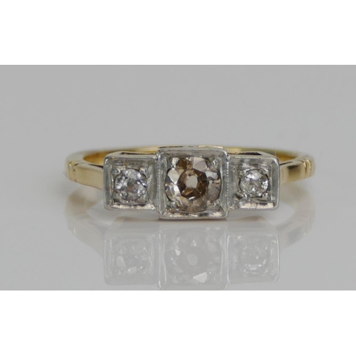 34 - An Old Cut Diamond Three Stone Ring, in a high carat precious yellow metal setting, c. 4.57mm centra... 