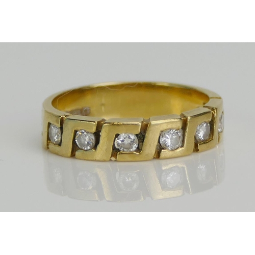 35 - An 18ct Gold and Diamond Six Stone Half Eternity Ring, c. 2.25mm brilliant round cuts, size L, 4.06g