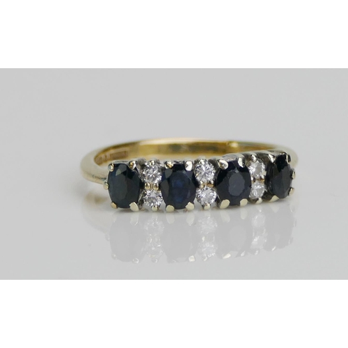 42 - A 9ct Gold Ten Stone Diamond and Sapphire Ring, size L, hallmarked, 2.1g