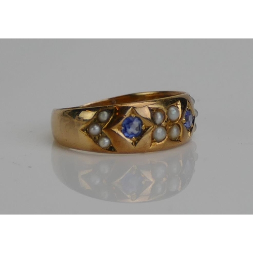 49 - An Antique 15ct Gold, Sapphire and Seed Pearl Ring, size J.75, Birmingham hallmarks (date letter obs... 