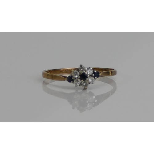 52 - A 9ct Gold, Sapphire and CZ Cluster Ring, size T.75, 1.51g