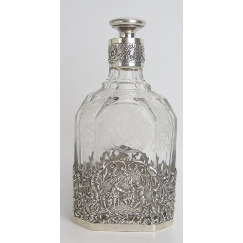 530 - A continental etched glass and silver mounted decanter and stopper, bears import marks, the mount de... 