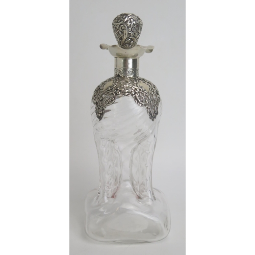 531 - A clear glass and silver mounted hour glass shaped decanter and stopper, 22cm high