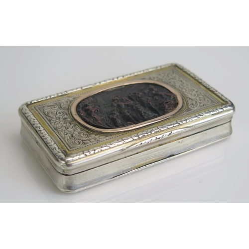 555 - An early 19th century French parcel gilt and silver  snuff box, stamped marks, of rectangular form, ... 