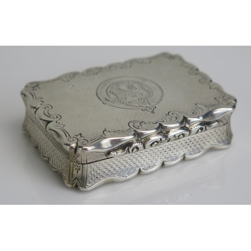 556 - A Victorian silver snuff box, maker William Dudley, Birmingham, 1860, of rectangular initialled and ... 