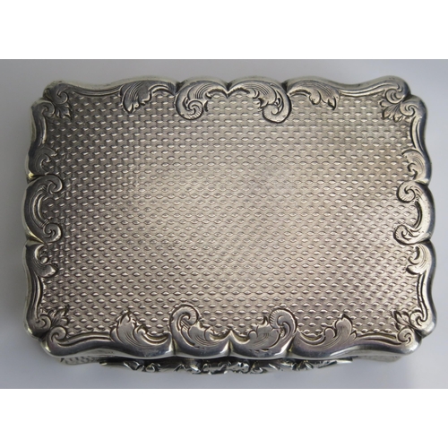 556 - A Victorian silver snuff box, maker William Dudley, Birmingham, 1860, of rectangular initialled and ... 