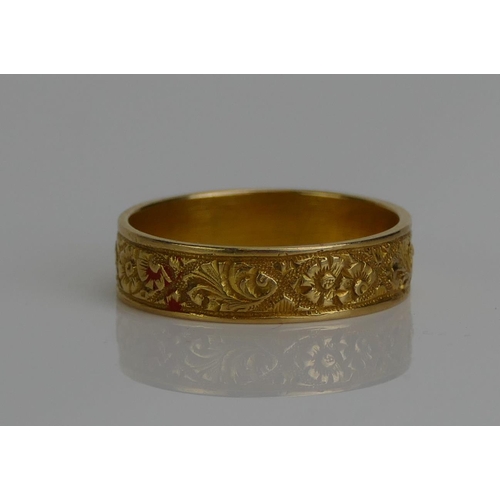 56 - A Victorian 18ct Gold Wedding Band with chased foliate decoration, c. 4.8mm wide, size N, London 187... 