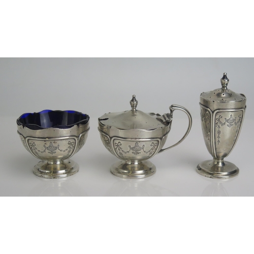 566 - A George V silver three-piece condiment set, makers mars worn Birmingham, 1911, 209gms, 6.72ozs