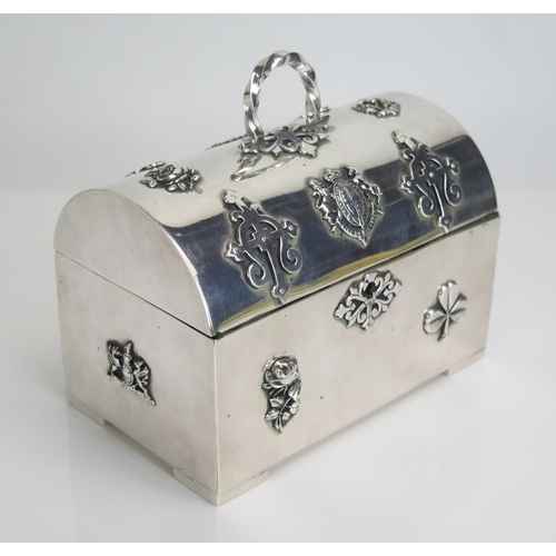 567 - A silver plated trinket casket with domed hinged lid, with velvet lined interior, bears assorted low... 