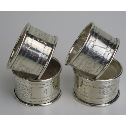 570 - A set of four George V silver napkin rings, maker's mark Sheffield, 1924, initialled, total weight o... 