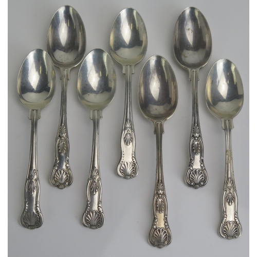 580 - Seven assorted Kings pattern coffee spoons, various makers and dates, total weight of silver 108gms,... 