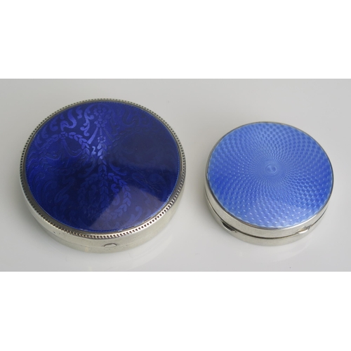 596 - A Sterling silver and enamel circular box, stamped marks, 6.5cm diameter and a smaller example, 5cm ... 