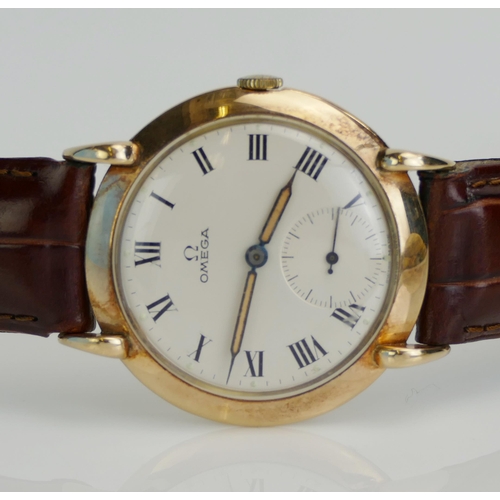 6 - An Omega 14K Gold Cased Gent's Dress Wristwatch, 35.5mm case with enamel dial having Roman numerals ... 