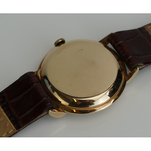 6 - An Omega 14K Gold Cased Gent's Dress Wristwatch, 35.5mm case with enamel dial having Roman numerals ... 