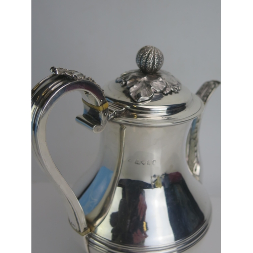 649 - A George IV silver coffee pot, maker Joseph Angell I, London, 1823, of squat baluster form with reed... 