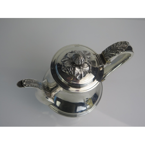 649 - A George IV silver coffee pot, maker Joseph Angell I, London, 1823, of squat baluster form with reed... 