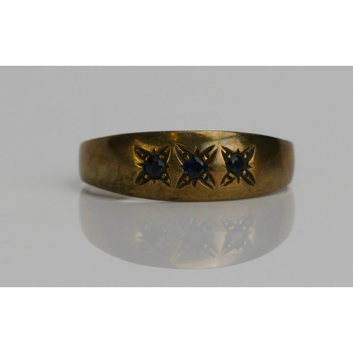 68 - A 9ct Gold and Sapphire Gypsy Ring, size T.25, hallmarked, 2.11g