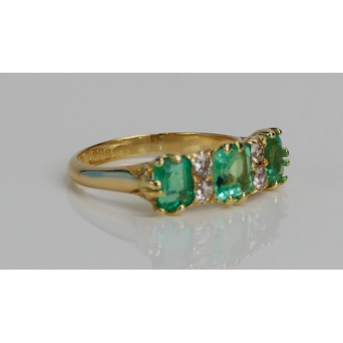 76 - An Antique18ct Gold, Emerald and Diamond Seven Stone Ring, c. 5.3mm principal stone, size N.5, Birmi... 