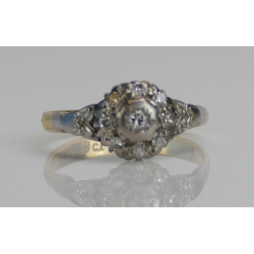 87 - An 18ct Gold and Old Cut Diamond Cluster Ring in a white metal setting, size K.5, stamped 18CT, 2.88... 