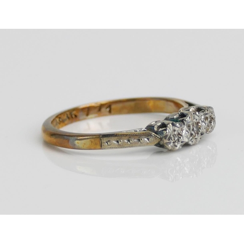 91 - A 9ct Gold and Diamond Three Stone Platinum Illusion Set Ring, size J, stamped 9CT&PLAT, 1.69g