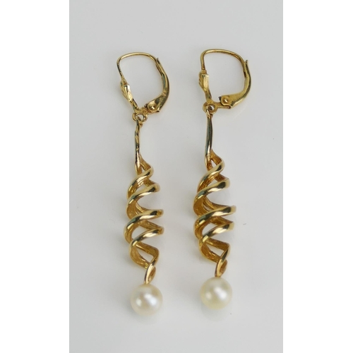 99 - A Pair of 14K Gold and Cultured Pearl Spiral Pendant Earrings, 53.77mm drop, stamped 585, 5.04g