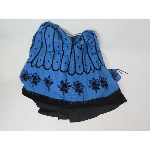 1765A - A late Victorian peacock blue silk skirt with applied black trim, a matching purse, assorted child.s... 