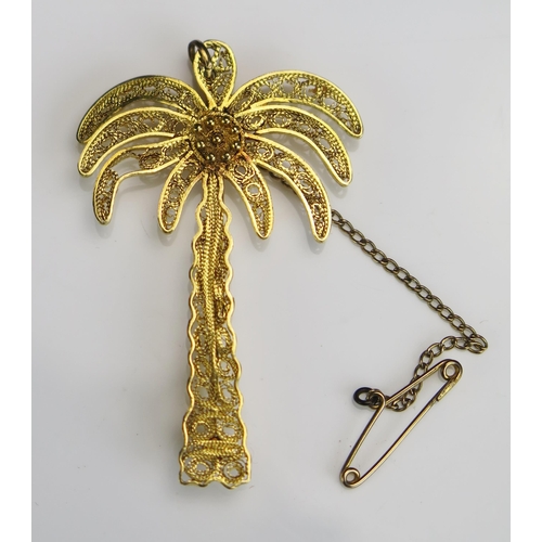 290 - A High Carat Precious Yellow Metal Filigree Palm Tree Brooch, 50.5mm tall, KEE tests as 18ct, 6.16g.... 