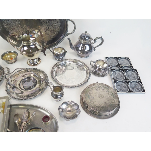 522 - A collection of assorted plated wares including tea service, tray, serving dishes, salver, flatwares... 