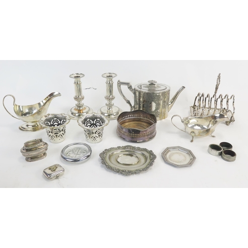 589 - A collection of assorted plated wares including. wine coaster, teapot, candlesticks, sauce boat, toa... 