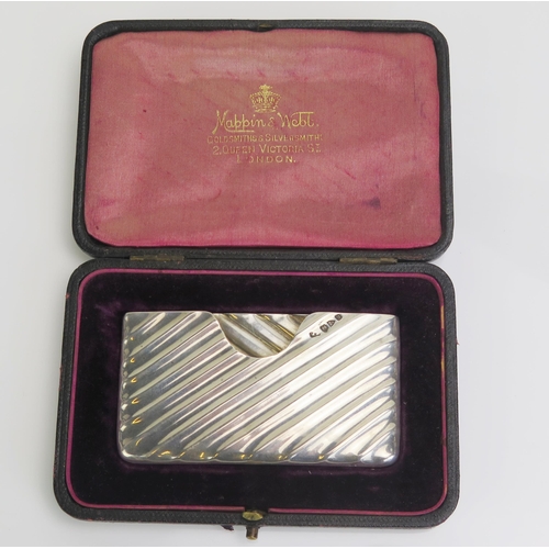 598 - A Victorian silver card case, maker's mark rubbed, Chester, 1895, 8.5cm wide, contained in a Morocco... 