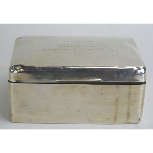 678 - A George V silver cigarette box, maker's mark worn, Birmingham, 1928, inscribed, of rectangular outl... 