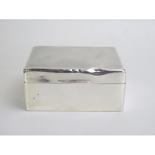 686 - An Edward VIII silver cigarette box, makers mark worn, Birmingham, 1936, of rectangular outline, wit... 