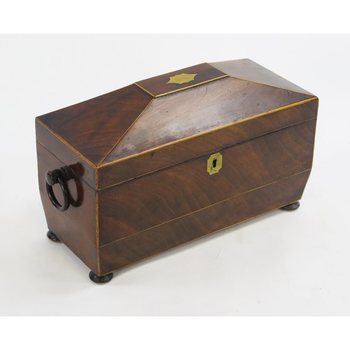 1299A - A 19th century mahogany and boxwood strung tea caddy of sarcophagus outline, the hinged lid enclosin... 