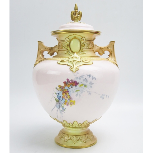 1030 - A Royal Worcester vase and cover, the blush ivory and pink ground decorated with floral sprays, 30cm... 