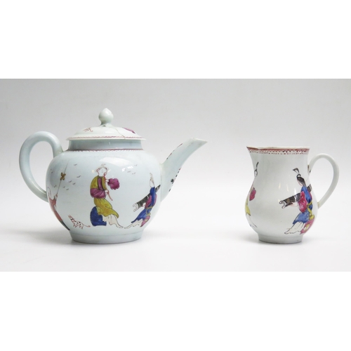 1038 - A Liverpool porcelain teapot and cream jug decorated in the Chinoiserie taste. A/F.