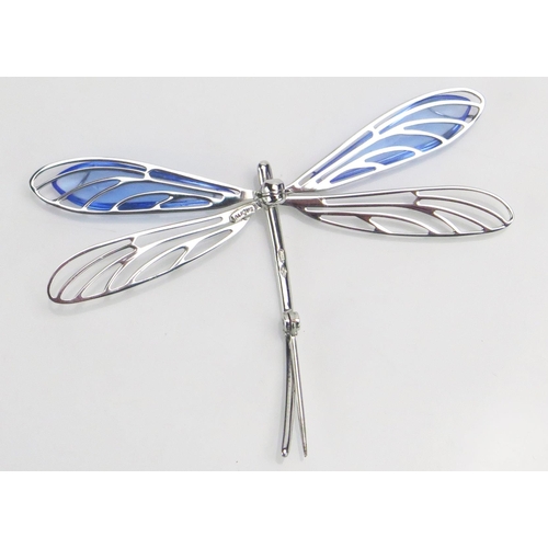 110 - A Lalique silver brooch, in the form of a dragonfly with blue glass wings, stamped 'BA 925 Lalique',... 