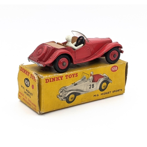 1134 - Dinky 108 MG Midget Sports in red with red hubs - very good in box