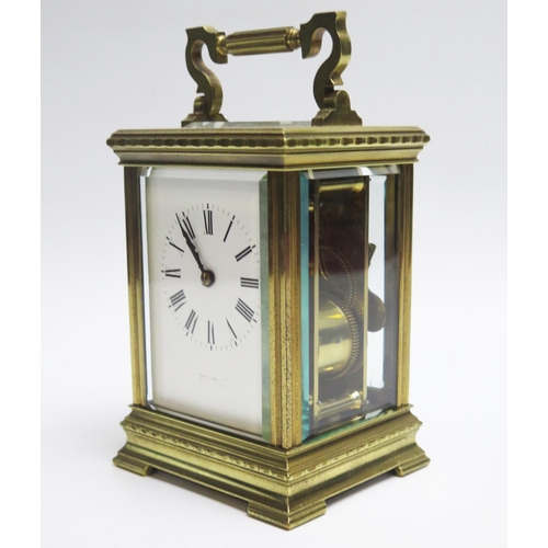 1201 - A French lacquered brass carriage clock, the 7.5cm roman dial with lever platform escapement strikin... 