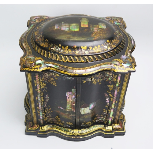 1215 - A Victorian papier-mache work box, of serpentine outline, with shallow domed hinged lid above a pair... 