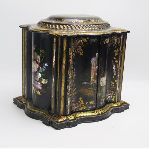 1215 - A Victorian papier-mache work box, of serpentine outline, with shallow domed hinged lid above a pair... 