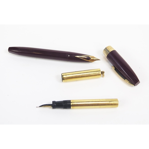 1220 - An 18ct gold Waterman lady fountain pen, together with a Scheaffer fountain pen. (2).