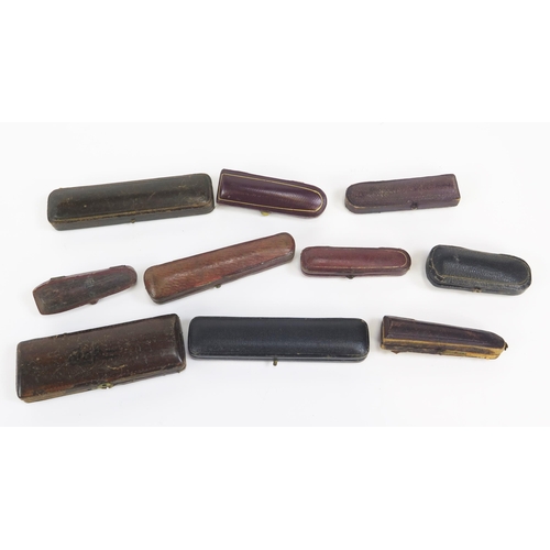 1227 - A collection of amber and other cheroot and cigarette holders, all cased.