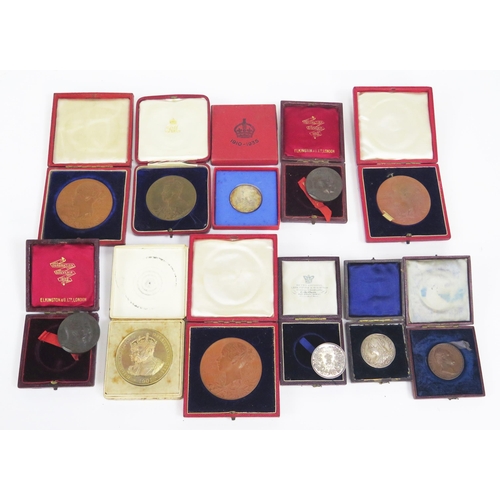 1233 - A collection of Royal commemorative medallions including  William IV Coronation, Victoria Diamond Ju... 