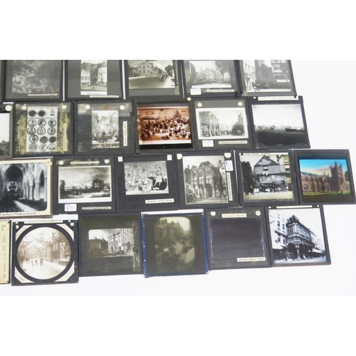 1236 - A collection of glass photographic slides of views Exeter, includes Southernhay House, the Clocktowe... 