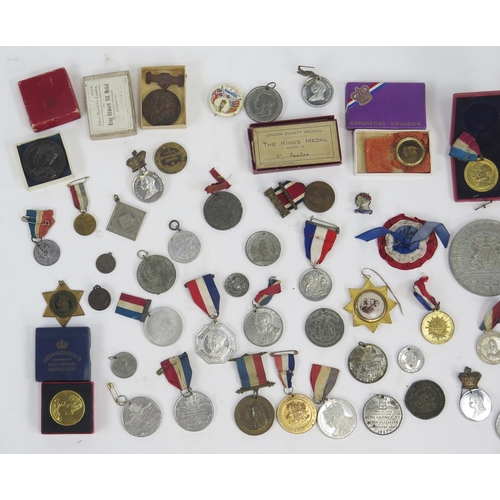 1240 - A large collection of royal commemorative medals, various monarchs, pin badges etc.