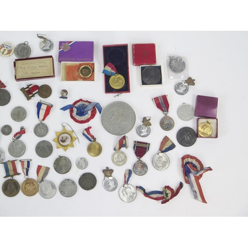 1240 - A large collection of royal commemorative medals, various monarchs, pin badges etc.